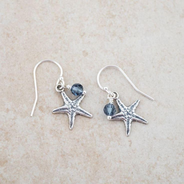 Sweet sterling silver starfish, accented with a denim blue crystal bead and finished on sterling silver French ear wires. The man on the beach was not discouraged by the vast number of starfish washed ashore. He continued to toss them back to sea. Like the man from the story, Jesus tenderly and lovingly rescued each of us. "For the Son of Man came to seek and save the lost." Luke 19:10 * Earrings measure 1/2" x 1/2" * .925 sterling silver * Make it a matching set with our Starfish Necklace * Pictured with 1" postage stamp for size * Made in the USA // Man On The Beach, Son Of Man, Washed Ashore, Diy Jewelry Earrings, Starfish Earrings, Starfish Pendant, Starfish Necklace, The Son Of Man, Jewelry Techniques