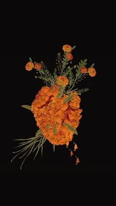 an orange bouquet of flowers on a black background