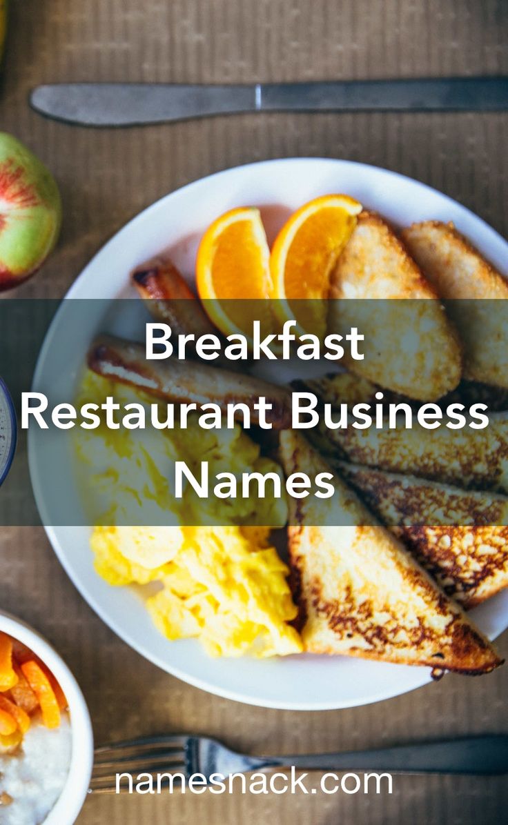 breakfast with eggs, toast and fruit on a table