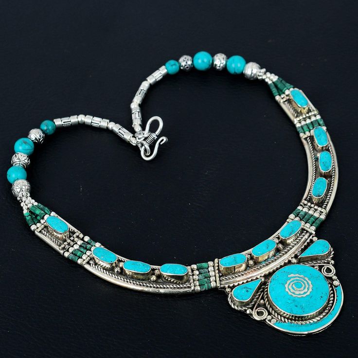 Turquoise Necklace Tibetan Silver Necklace Handmade Amazing Necklace Tibetan Jewelry Charm Tribal Statement Necklace Engagement Gift For Her SKU :- PT-129 Statement Tibetan Necklace Metal Purity :- Tibetan Silver Gemstone :- Turquoise Stone Color :- Green Necklace Length :- 18 Inches ########## * They are handmade and designed carefully by craftsmen * Different gemstones and brass parts brought together to create an elegant piece * These are pieces to treasure that are sure to get you or your loved ones noticed for the right reasons! ########## Color, shades, texture displayed may slightly vary from the actual product due to digital image limitations. We request you to consider these minor variations. Please expect the possibility of some slight imperfections when buying handmade jewelry. Necklace For Bride, Tibetan Necklace, Engagement Gifts For Her, Green Beaded Necklace, Tibetan Jewelry, Necklace Birthstone, Tibetan Turquoise, Cocktail Jewelry, Christmas Necklace