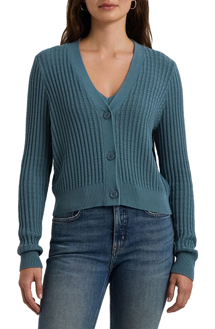 Textured ribbing brings rich dimension to this cropped cardigan knit for cool, lightweight layering from fine cotton-blend yarns. Front button closure V-neck Long sleeves with ribbed cuffs 60% cotton, 40% modal Dry clean or machine wash, dry flat Imported Fitted Button-up Blue Cardigan, Fitted V-neck Cardigan With Textured Knit, Cotton V-neck Ribbed Cardigan, Ribbed Cotton V-neck Cardigan, Affordable Blue Button-up Cardigan, Blue Textured Knit Long-sleeve Cardigan, Ribbed Cardigan, Cropped Cardigan, Knit Cardigan