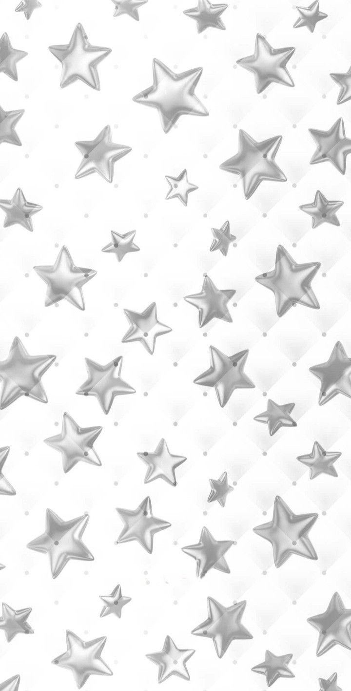 silver stars on white background with room for text