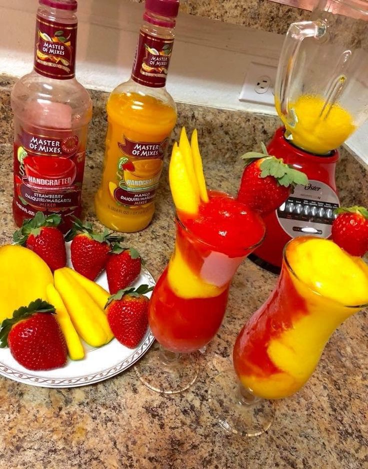 some fruit and drinks on a counter top