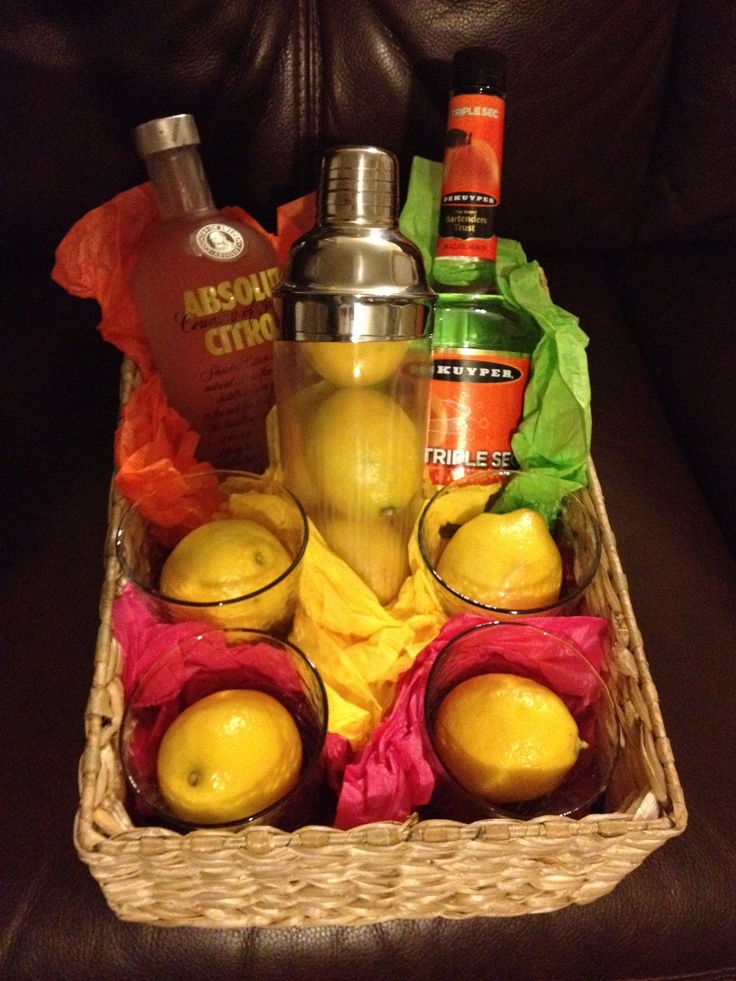 a basket filled with lemons and drinks