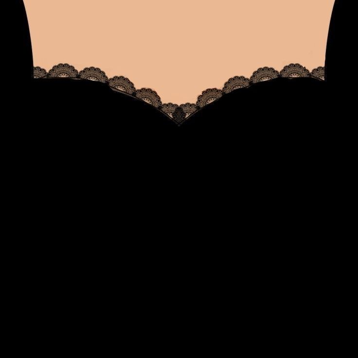 the back of a woman's bra with lacy lace on it, in front of an orange sky