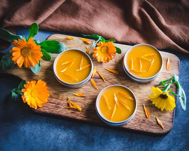 How to Make Calendula Salve & Calendula Salve Benefits - Calendula is a beautiful flower with powerful medicinal benefits. It's often used in natural remedies, salves, and creams, and is a terrific healing herb to have in your herbal medicine cabinet. Make the best use of its healing powers with this easy calendula salve. Herbalism for Beginners | DIY Herbal Self Care Skincare Knowledge, Herbal Salve Recipes, Calendula Salve, Homemade Body Care, Calendula Benefits, Salve Recipes, Skin Rashes, Herbal Salves, Medicinal Garden