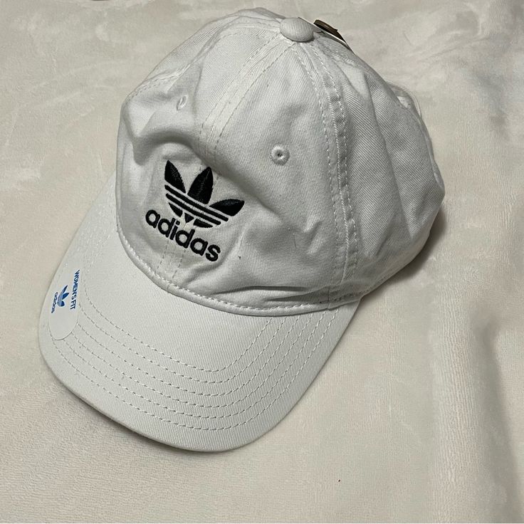 A Soft White Adidas Hat. New With Tags And Open To Offers Adidas Cotton Snapback Baseball Cap, Adidas Cotton Hat With Curved Brim, Adidas Cotton Hats With Curved Brim, Adidas Hats For Summer Streetwear, Adidas Sporty Hats For Spring, Adidas White Curved Brim Hat, Adjustable Adidas Cotton Hat, Adjustable White Adidas Hat, Adidas Cotton Baseball Cap For Spring