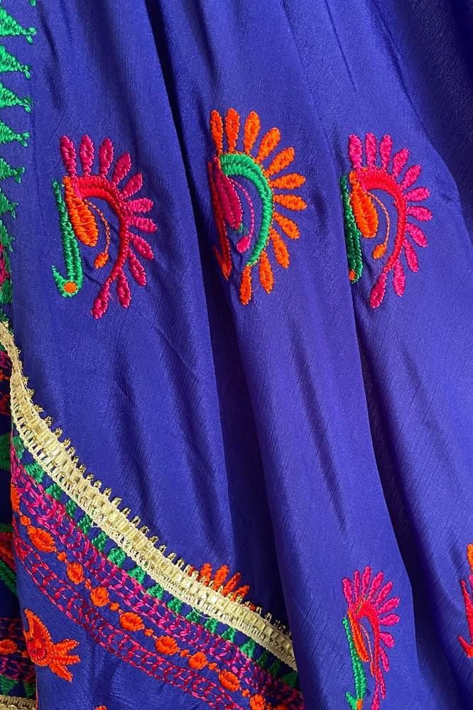 A magnificent display of luxury and culture, this richly detailed Peacock Chinon Phulkari Dupatta is the perfect accessory to elevate your look. Crafted from Semi Chinon silk fabric and adorned with a timeless peacock motif embroidery, it will instantly add a hint of Punjabi Phulkari style to any ensemble for a truly elegant, sophisticated finish. Semi Chinon Silk Phulkari embroidery, machine work Multicolor silk thread 2.25 meters Ready to ship Soft wash Traditional Art Silk Anarkali Set With Multicolor Embroidery, Traditional Wear With Resham Embroidery In Royal Blue, Traditional Blue Anarkali Set With Resham Embroidery, Blue Traditional Wear With Resham Embroidery For Ceremonies, Festive Blue Anarkali Set With Pallu, Blue Unstitched Anarkali Set For Festivals, Traditional Royal Blue Wear With Resham Embroidery, Embroidered Blue Traditional Wear For Ceremonies, Blue Festive Anarkali Set