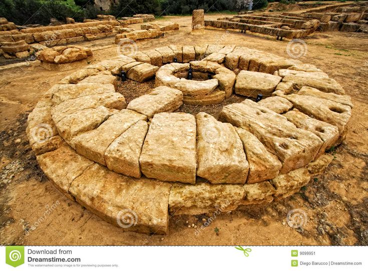 an ancient stone structure in the middle of nowhere