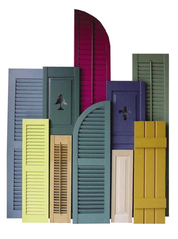 there are many different colored shutters on this wall