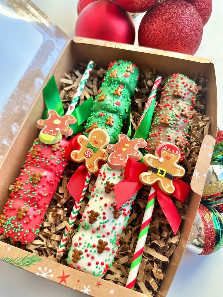 a box filled with christmas crackers and candy canes