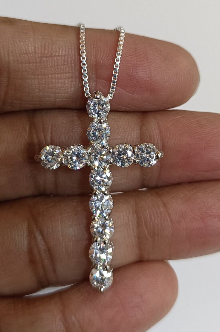 2.50 Ct Round Cut Simulated/Moissanite Diamond Cross Pendant Necklace 18" Chain 14k White Gold Finish Brand:Tishya Jewellers  Style:Pendant Main Stone:Simulated Diamond / Moissanite Theme:Cross Pendant Metal:Sterling Silver Length:18 - 19.99" Metal Purity:925 parts per 1000 Modified Item:No Stone Creation:Simulated / Moissanite Gender:Unisex Certification:N/A Cut:Excellent Country of Origin:India Total Carat Weight (TCW):2.50 ct Country/Region of Manufacture:India Length (inches):18" Main Stone Creation: Simulated/Moissanite Fancy Diamond Colour:White Main Stone Shape:Round Metal Finish:14k White Gold Finish Secondary Stone:Simulated Diamond/Moissanite Buyer Note:Chain Not Send As Per Picture ANY SIZE, COLOR, CLARITY, SHAPE REQUIREMENT FOR OUR DIAMONDS AND OTHER PRODUCTS ARE MOST WELCOME T Moissanite Necklace With Vs Clarity Round Pendant, Gia Certified Pendant Necklaces For Anniversary, Gia Certified Pendant Necklace For Anniversary, Gia Certified Moissanite Jewelry As A Gift, Gift Cross Pendant Necklace With Prong Setting, Gia Certified White Jewelry As A Gift, Gia Certified White Jewelry Gift, White Moissanite Necklaces For Anniversary, Gia Certified Sterling Silver Pendant Necklace