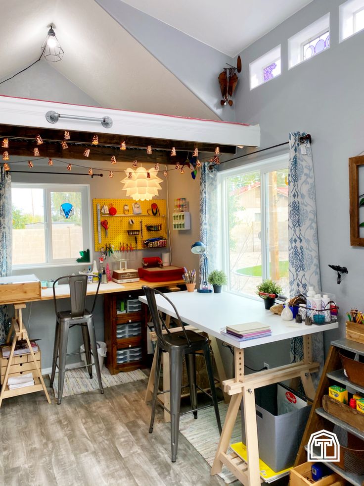 the kitchen is clean and ready to be used as a playroom or office area