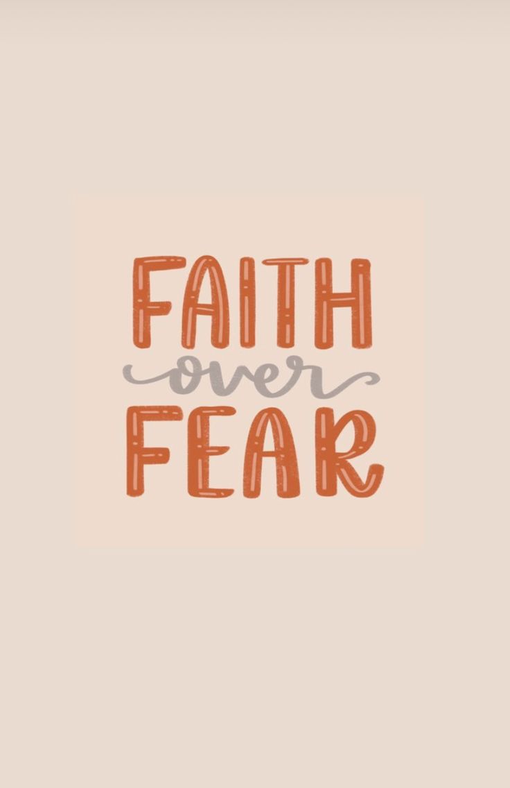 the words faith over fear written in orange and gray ink on a light pink background