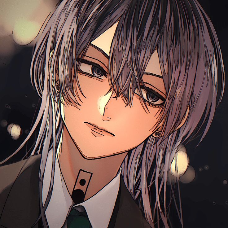 an anime character with long hair wearing a suit and tie, staring at the camera