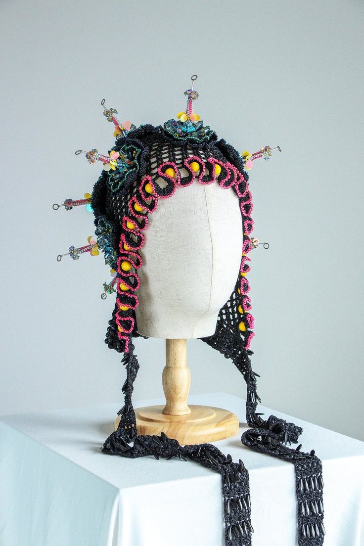 Black crochet hat festival headdress | Etsy Bohemian Costume Hat With Structured Crown For Festivals, Carnival Beaded Adjustable Headpieces, Carnival Adjustable Beaded Headpiece, Black Bohemian Crochet Hat, Black Bohemian Knitted Hat, Handmade Summer Festival Headpieces, Whimsical Black Hat For Festival, Festival Bead Caps Headpiece, Handmade Whimsical Headpiece For Carnival