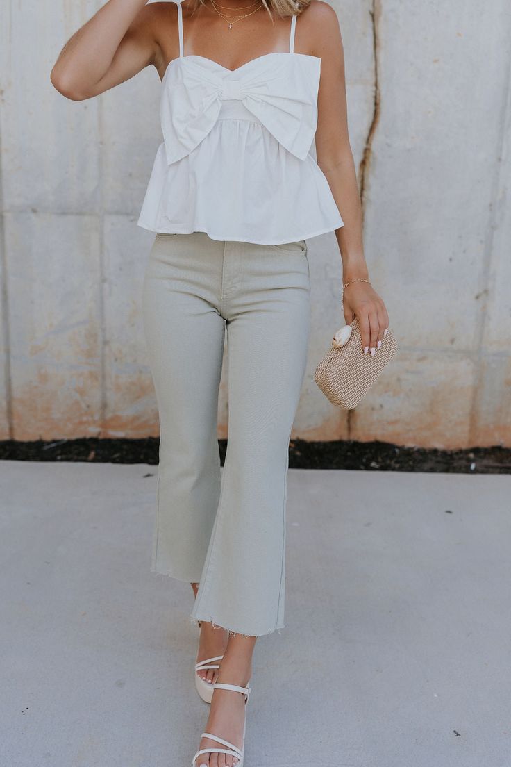 The Raelynn Sage Wide Leg Pants, where comfort meets style in a delightful blend. Crafted from light sage denim fabric, these pants exude a fresh and contemporary vibe that's perfect for any occasion. The wide pant leg design of the Raelynn pants offers a modern silhouette that's both flattering and on-trend. Enhanced with a raw hem detail, they add a touch of casual chic to your look, making them ideal for both daytime adventures and evening outings. Featuring a front zipper with button closure and belt loops, these pants provide a secure and adjustable fit for all-day comfort. With two front pockets and two back pockets, they offer both style and functionality, ensuring you have ample space to carry your essentials while on the go. Elevate your everyday style with the Raelynn Sage Wide L Aesthetic Shirt, Travel Dress, Jumpsuit Shorts Rompers, Leg Design, Maxi Dresses Casual, Wide Pants, Romper Pants, Unisex Style, Everyday Style