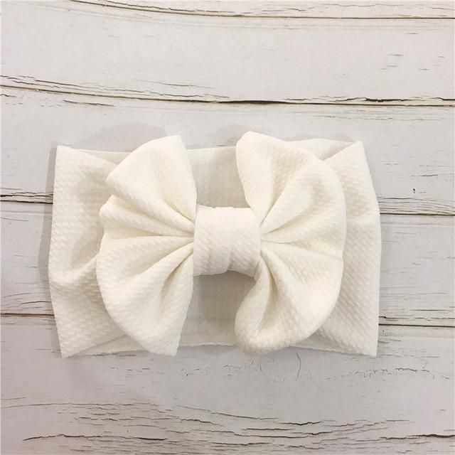 The Oversized Bow Headband for baby infant toddler girls Adjustable White Headband For Playtime, White Bow With Matching Headband, White Headband With Bow Tie, White Cotton Hair Accessories For Gifts, White Bow Tie Headband, White Cotton Hair Accessories For Gift, White Cotton Hair Accessories As Gift, Playful Bow Headband For Gift, Adjustable White Bow With Matching Headband