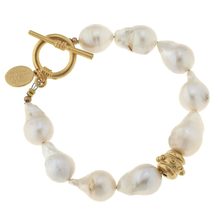 The beauty of baroque pearls is their uniqueness - each pearl varies in size and shape. Approximately 8" inches long Genuine baroque pearls, triple plated 24K gold Toggle clasp Add an extender for extra length Handmade in San Antonio, TX Susan Shaw, Diamond Initial Necklace, Toggle Bracelet, Bijoux Diy, Baroque Pearls, Gold Beads, Pearl Bracelet, Silver Bracelets, Pearl Jewelry