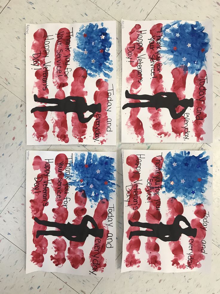 four red, white and blue handprints with scissors on them