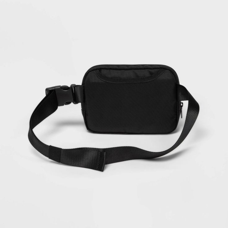 Why we're ALL IN: Fanny pack is perfect for carrying small essentials while working out or on the go. The main body is made from water-repellant 100% recycled polyester fabric, and it boasts a top zipper closure with inner phone pouch plus a smaller outside zippered pocket to keep small items like keys and snack bars secure and close at hand. Use the adjustable buckle waist strap to find the perfect fit. All in Motion™: Made for every move, priced for every day. Sporty Everyday Nylon Belt Bag, Sporty Nylon Belt Bag For Everyday, Functional Sports Belt Bag With Cell Phone Pocket, Functional Belt Bag With Cell Phone Pocket For Sports, Sporty Nylon Belt Bag For Sports, Everyday Functional Nylon Belt Bag, Functional Black Nylon Chest Bag, Functional Nylon Belt Bag For Everyday Use, Functional Black Chest Bag With Pockets