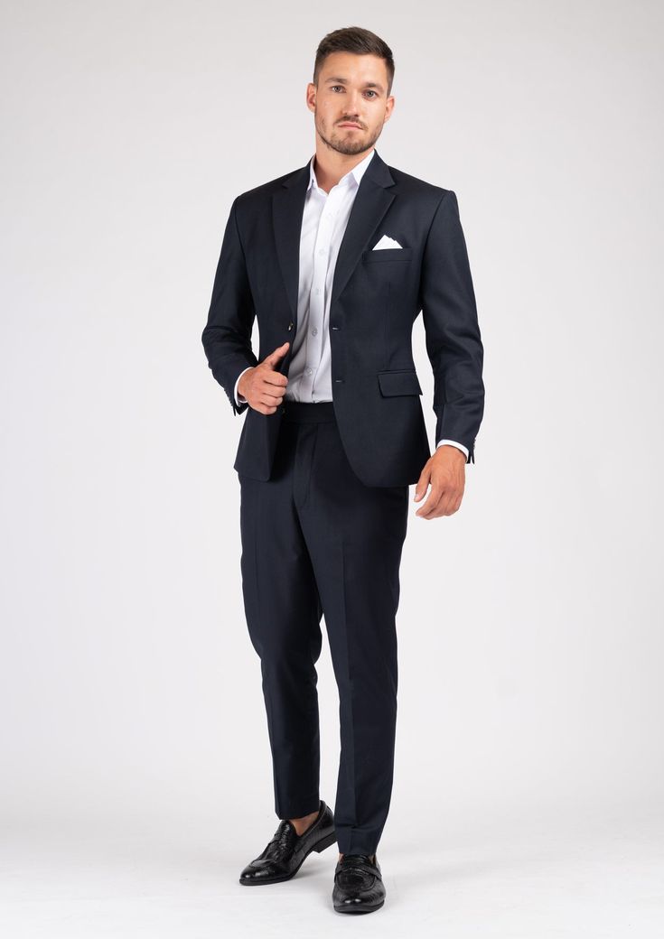 The Astor Dark Navy Twill Suit is an elegant and timeless professional wardrobe staple. Versatile for a variety of occasions, get ready to look your best in this custom made suit, wherever you wear it. Elegant Semi-formal Pantsuit With Pressed Crease, Elegant Suits With Notch Lapel, Elegant Tailored Suit, Elegant Formal Blazer With Suit Collar, Professional Single Breasted Suiting Fabric Sets, Professional Single-breasted Suiting Fabric Set, Elegant Custom Fit Three-piece Suit With Welt Pockets, Semi-formal Custom Fit Set With Notch Lapel, Custom Fit Notch Lapel Set For Semi-formal Occasion