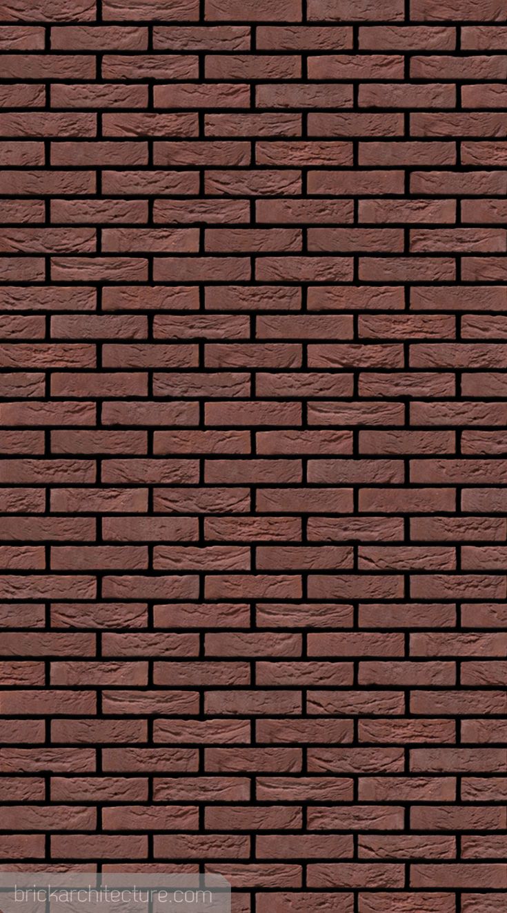 a brick wall that is made out of red bricks