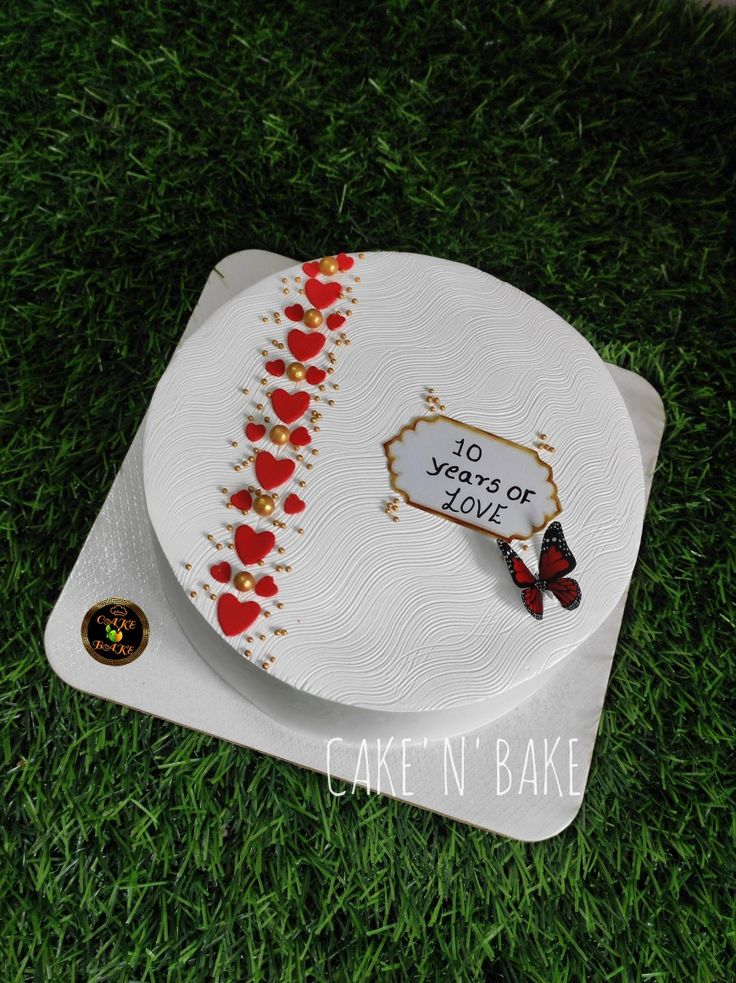 a cake decorated to look like a love letter