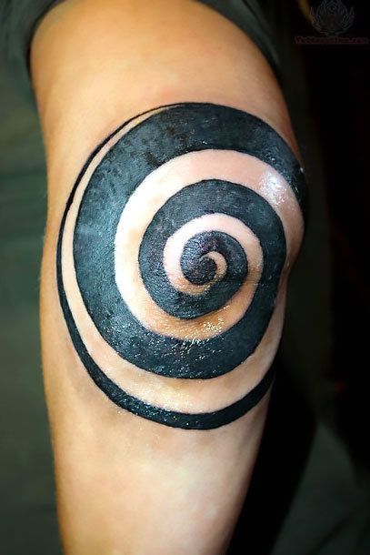 a man's arm with a black and white tattoo design on it, depicting a spiral