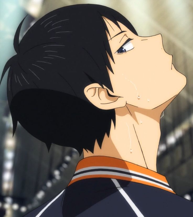 an anime character with black hair looking up at something in the air and his eyes open