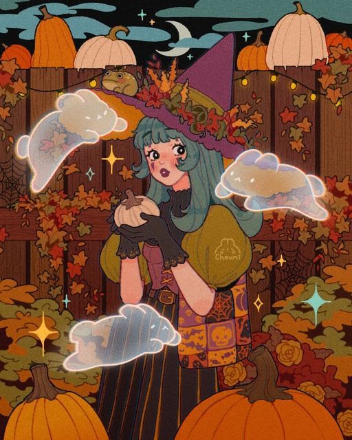 a woman holding a cat in her arms surrounded by pumpkins and other autumn decorations