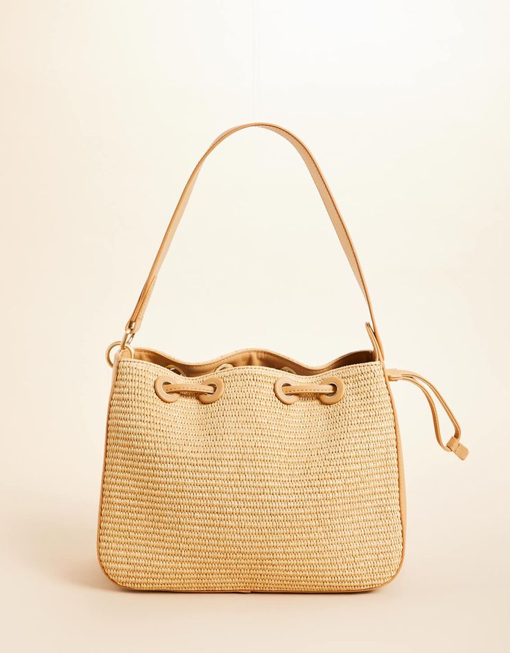 Our new Drawstring is simple, yet sophisticated in a straw and top grain Napa leather. Wear the thick leather strap over your shoulder and let this Drawstring take you from the coast to the mainland and back! Open the drawstring to find 2 slip pockets and a zipper pocket. Calm Waters, Spartina 449, Leather Wear, Calm Water, Neutral Fashion, The Coast, Drawstring Bag, Zipper Pocket, Leather Straps