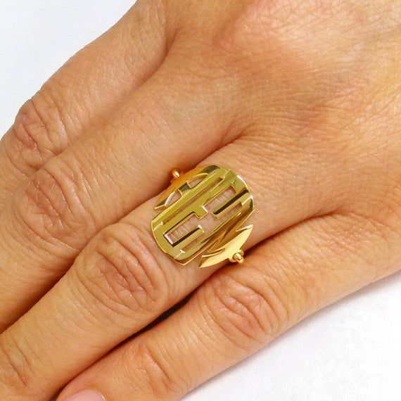 ***Orders submitted by December 18, 2017  will receive FREE SHIPPING UPGRADE for a Christmas DeliveryOrders submitted by December 15 are Guaranteed for Christmas Delivery.This Personalized monogram Ring is 0.75  inch wide, made of solid 14k yellow gold. The ring can be made with the initials of your choice. Please use the note section available at checkout to let us know the Initials you would like personalized, a fun ring that's great for every day wear with a sophisticated look. Makes a great 14k Gold Monogram Initial Ring Fine Jewelry, 14k Gold Monogram Initial Ring, 14k Yellow Gold Monogram Initial Ring, Monogrammed 14k Yellow Gold Initial Ring, Modern Yellow Gold Initial Ring With Monogram, Classic Monogram Open Ring Jewelry, Modern Personalized Initial Ring In Yellow Gold, Classic Monogram Initial Ring In Yellow Gold, Yellow Gold Initial Ring With Monogram