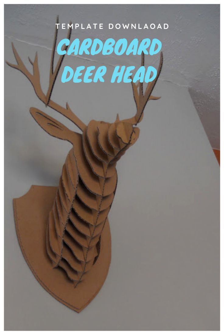 a cardboard deer head with the words cardboard deer head on it's back side