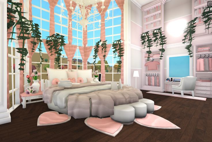 a bedroom decorated in pastel pink and white