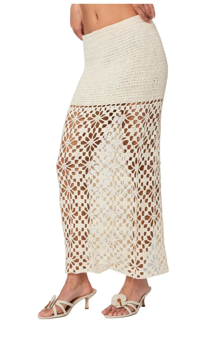 A handcrafted crochet maxi skirt blossoming with floral detailing is made with a step-easing slit at the back. Pull-on style Partially lined 100% Acrilan acrylic Hand wash, dry flat Imported Wedding Crochet, Maxi Skirt Outfit, Slim Fit Cargo Pants, Crochet Maxi Skirt, Crochet Bottoms, Fabric Matching, Crochet Wedding, White Boho Dress, Crochet Maxi