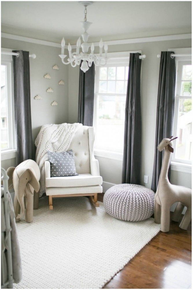 an image of a baby's room with white furniture and gray drapes on the windows