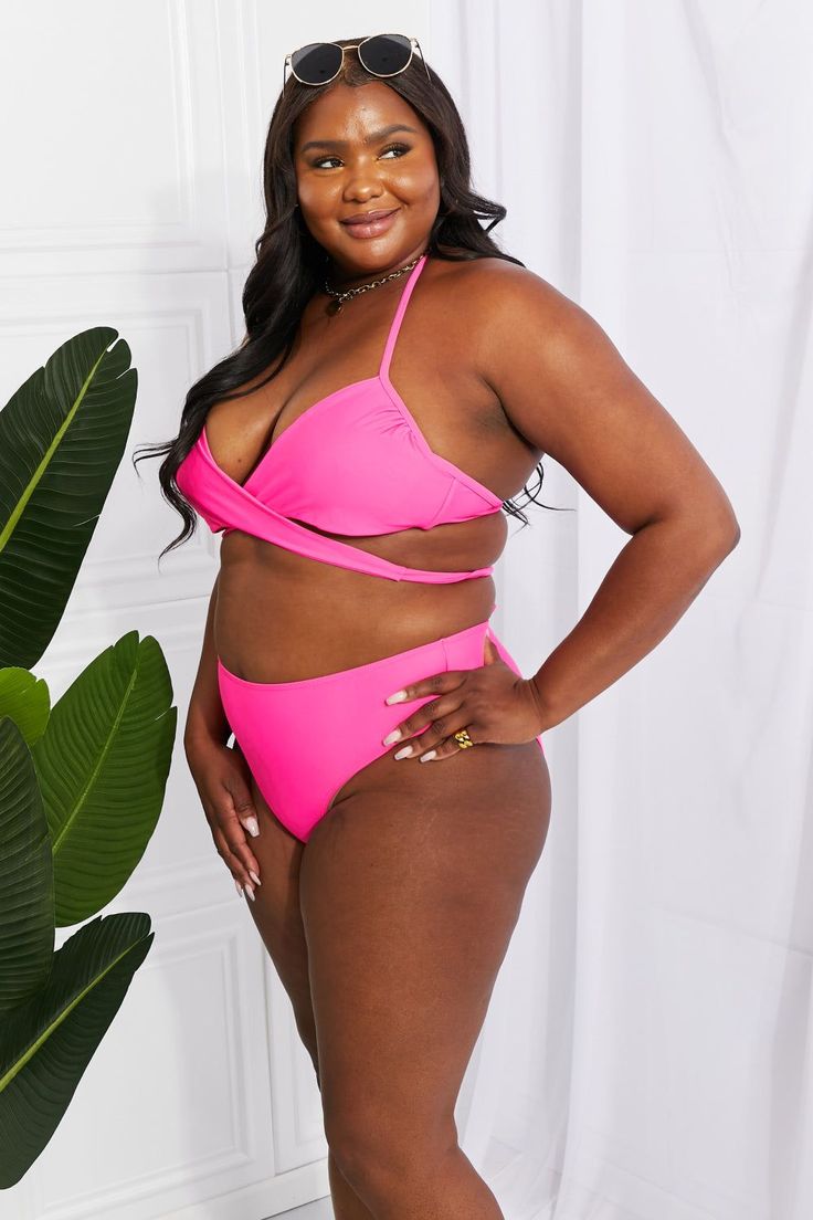 Make a splash this summer in this halter bikini, which features a double strap around the back, a twisted front, and midrise bottoms. The non-removable padding adds coverage, support, and lift to make you feel your best whether you're lounging poolside, enjoying a day on the boat, or building sandcastles with your littles. Note: Runs small, order one size up. If in between sizes, order one size up. Top type: No underwire Bottom type: Mid waist Sizing Category: Regular Number of pieces: Two Patte Crisscross Swimwear With Built-in Bra For Beach, Crisscross Swimwear With Built-in Bra For Vacation, Vacation Swimwear With Crisscross Straps And Triangle Top, Pool Swimwear With Crisscross Triangle Top, Beachwear Swimwear With Crisscross Tie-side Bottom, Triangle Top Swimwear With Crisscross Straps For Pool, Beach Triangle Halter Top With Crisscross Straps, Beach Halter Top With Crisscross Triangle Straps, Beach Halter Top With Crisscross Straps