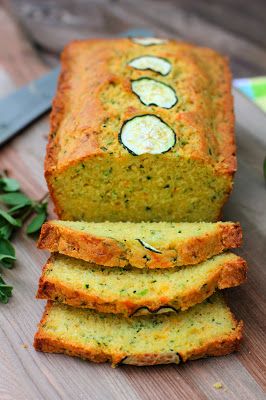 sliced bread with cucumbers on top and parsley next to it