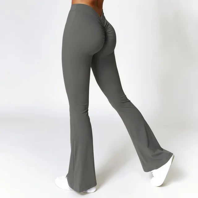 Designed for maximum flexibility and comfort during yoga sessions, our Flare Leggings feature a unique V-Shaped Hip design. This allows for a flattering fit while providing support and coverage. Say goodbye to discomfort and hello to style with these leggings. V Cut Leggings, Yoga Flare Pants, Cut Leggings, Legging Sport, Bell Bottom Pants, Flare Trousers, Compression Leggings, Flare Leggings, Sports Leggings