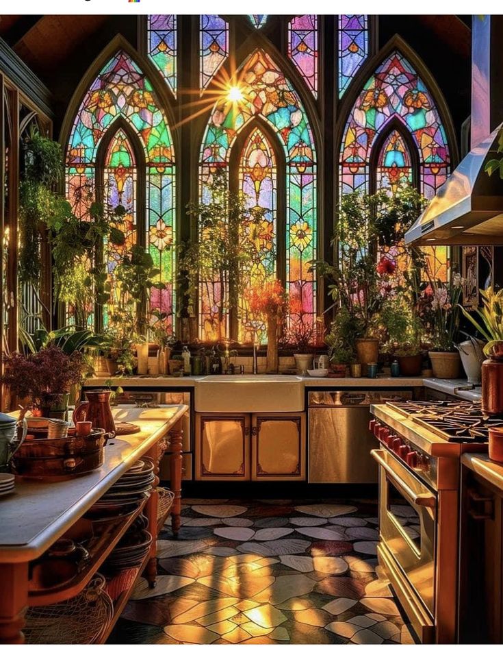 the kitchen is decorated in stained glass and has many potted plants on the counter