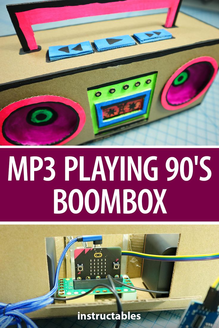 a boombox made out of cardboard with the words mp3 playing 90's boombox