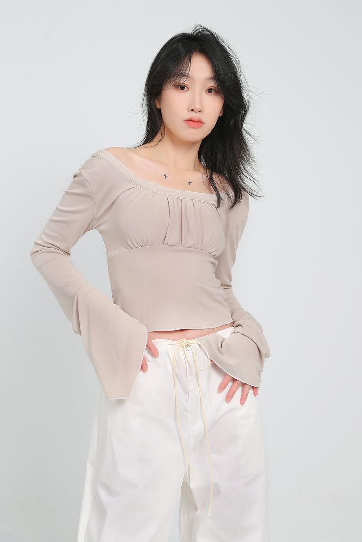 With all the comfort of a casual tee and the style of a dressy top, this crop top is a must-have for your wardrobe. A lightweight and airy fabric makes this crop top a perfect choice for a hot day or a night out on the town. The ruched front detail adds a touch of glamour, while the flare sleeves keep things interesting.
Gender: Women
Material: Polyester
Clothing Length: Short
Sleeve Length: Long Sleeve
Sleeve Type: Angel Sleeve Flare Long Sleeve, Flare Sleeves, Angel Sleeve, Night Out On The Town, Hot Day, Urban Wear, Dressy Tops, Long Sleeve Crop, Out On The Town