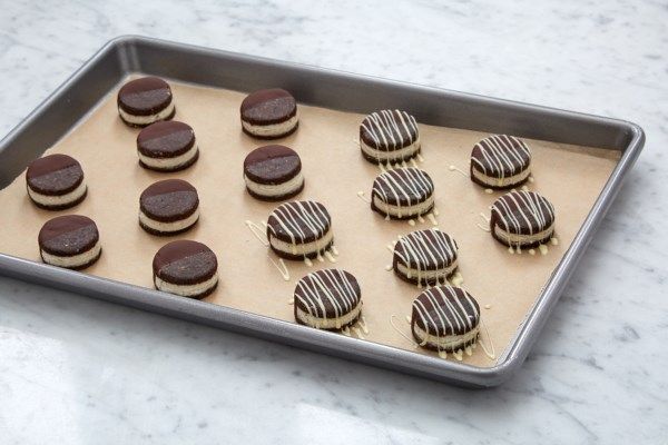 chocolate covered cookies on a cookie sheet ready to be baked