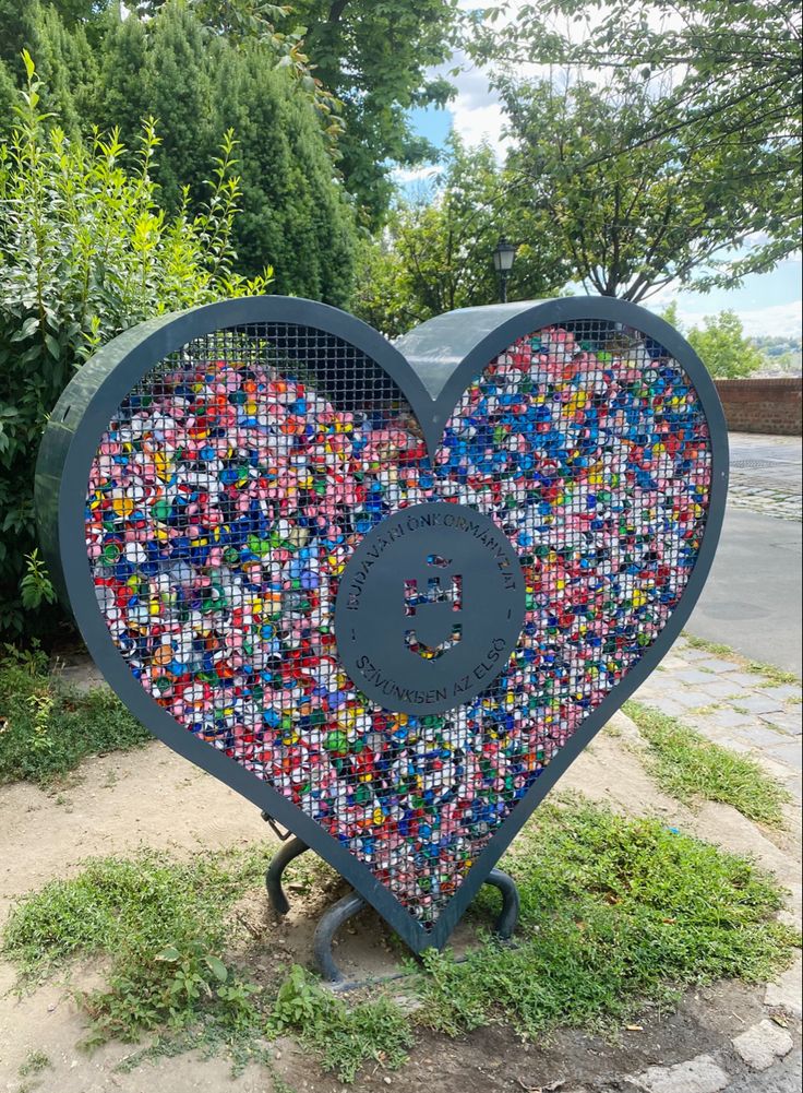 a large heart shaped sculpture made out of legos