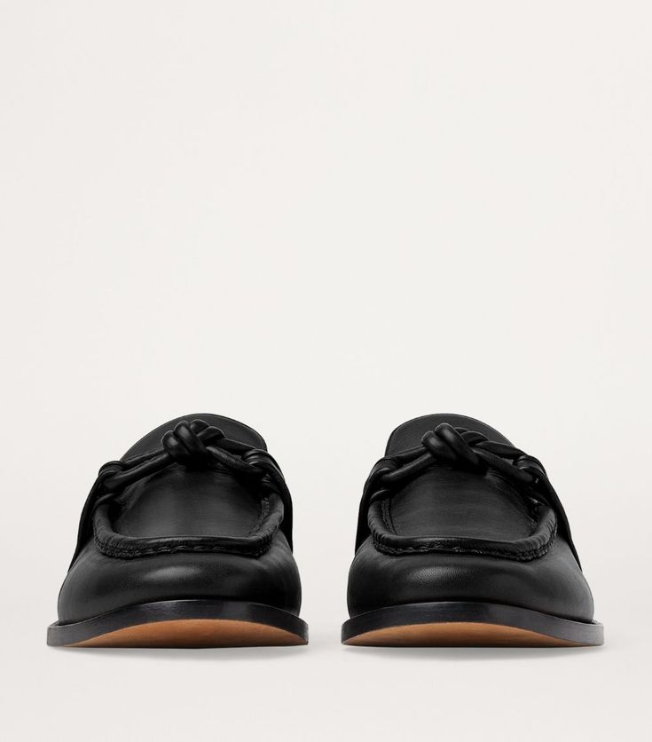 Find BOTTEGA VENETA Leather Astaire Loafers on Editorialist. If there's one brand that's renowned for butter-soft leather designs, it's Bottega Veneta. The Italian label cuts the Astaire loafers from the same smooth calfskin as its iconic accessories for a signature aesthetic, with a matching knot atop the tongue communicating the pair's premium origins without even a hint of written branding. Iconic Accessories, Signature Aesthetic, Leather Designs, Trainer Boots, Shoes Heels Pumps, Boots Knee, Luggage Accessories, Leather Design, Trouser Jeans