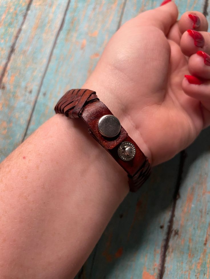 NEW TYPE : Bracelet COLOR : Brown Handmade Brown Leather BraceletThis beauty measures 5/8 inches wide. It is 8 inches in length. Size can be adjusted smaller with the snaps. This listing is for 1 bracelet only. will vary Thank you for checking out our store. Please contact us with any questions.Listed with ExportYourStore.com12/29/22 Brown Adjustable Band Bracelet Jewelry, Adjustable Brown Wristband With Bracelet Strap, Adjustable Brown Cuff Bracelet For Everyday, Adjustable Brown Bracelet, Adjustable Brown Wristband For Everyday Use, Adjustable Brown Bracelets For Everyday Use, Adjustable Brown Braided Bracelet For Everyday Use, Adjustable Everyday Jewelry Bracelet, Adjustable Brown Cuff Bracelet With Strap