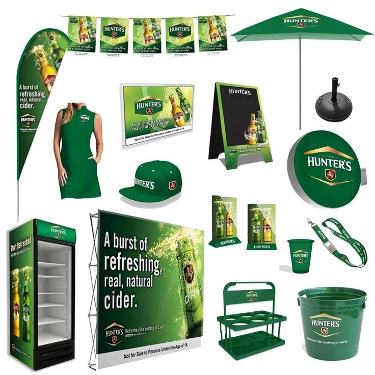 an assortment of advertising items including a green umbrella and other items to be used for promotional purposes