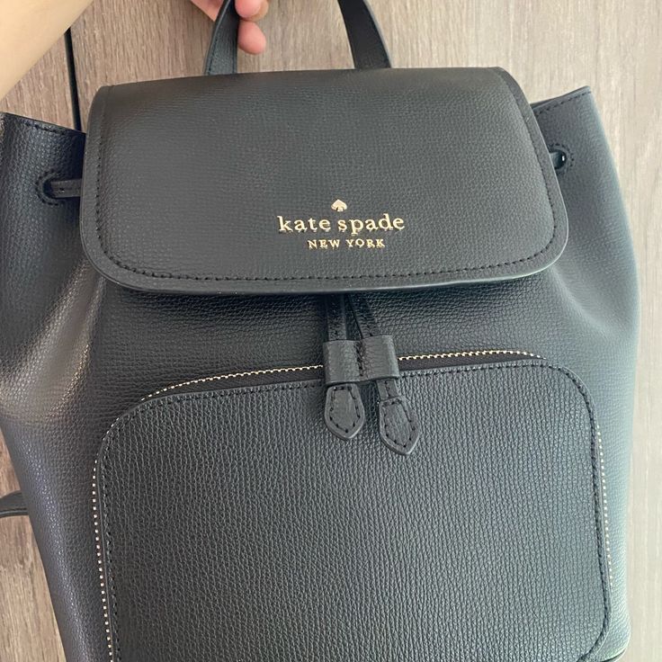 Brand New Never Been Used Kate Spade Black Leather Flap Backpack! Trendy Kate Spade Standard Backpack, Trendy Kate Spade Backpack, Kate Spade Backpack With Removable Pouch, Everyday Crossbody Backpack With Dust Bag, Casual Kate Spade Standard Backpack, Kate Spade Travel Bag With Adjustable Strap, Kate Spade Travel Backpack With Adjustable Strap, Kate Spade Travel Backpack, Elegant Kate Spade Backpack With Zipper Closure