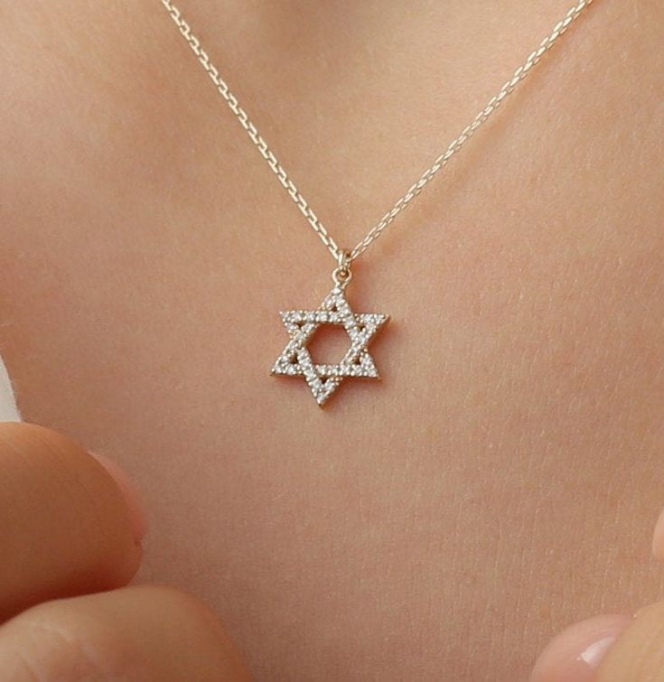 14k Gold Star of David Diamond Necklace / Solid Gold Diamond Necklace / Jewish Gift / Religious Star Necklace / Full Cut Natural Diamonds ✔ Handmade ✔ Solid Gold ✔ Star Size: 12mm ✔ Diamond Ct Weight: .11ctw Worldwide DHL shipping now available 1-3 business days NOW USING ITALIAN TRIGGER LOBSTER CLASPS Available 14K Solid White, Solid Yellow, Solid Rose Gold 🛠 All Sarah Elise pieces are handcrafted to order, please allow 4 - 10 business days for shipping out. Need it sooner? Just ask and we wil Dainty Star Of David Jewelry For Anniversary, Star Of David Necklace With Diamond Accents For Anniversary, Star Of David Necklace With Diamond Accents As Gift, Star Of David Charm Jewelry For Anniversary, Diamond Star Of David Necklace As Gift, Star Of David Necklace With Diamond Accents For Gift, Star Of David Necklaces With Diamond Accents For Gift, Sterling Silver Star Of David Necklace For Anniversary, Gift 14k Gold Star Of David Necklace